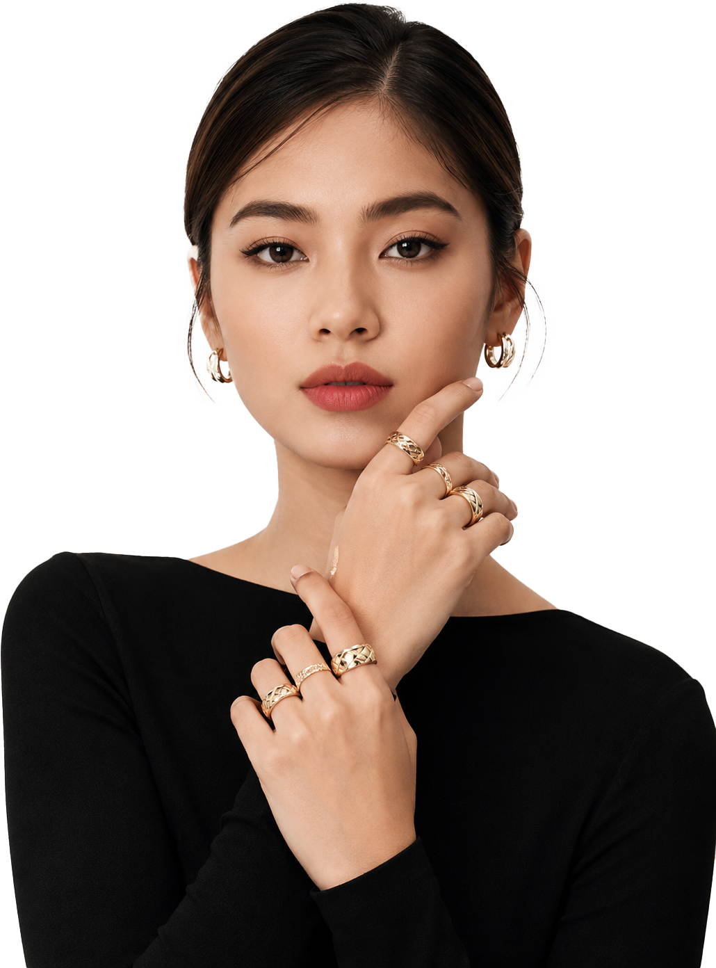 Model wearing gold WLYN rings and earrings
